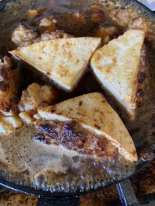 Nyong tofu: little triangles of tofu filled with meat, then braised